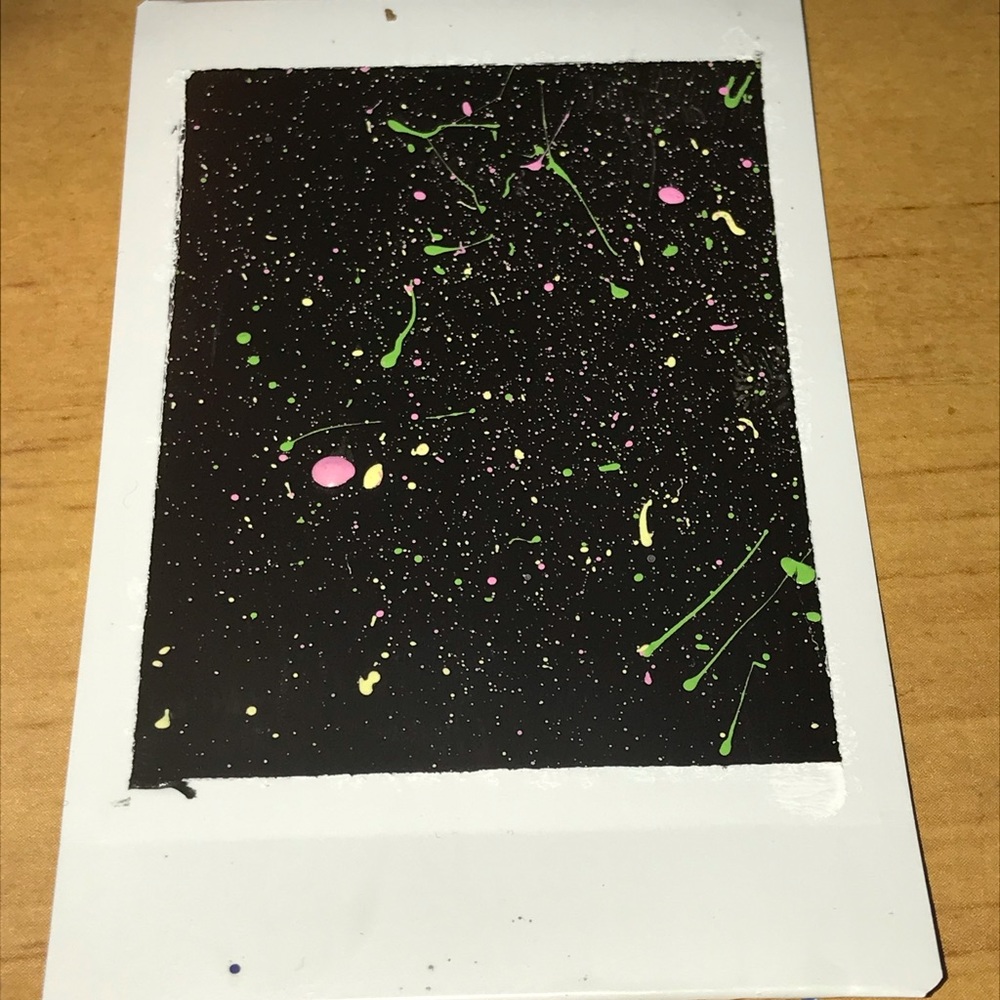 Painted polaroid pictures